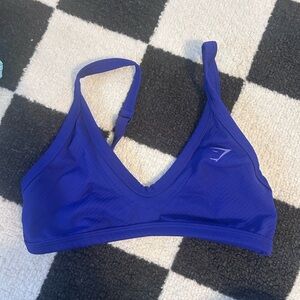 Gymshark sports bra 
Size small royal purple color